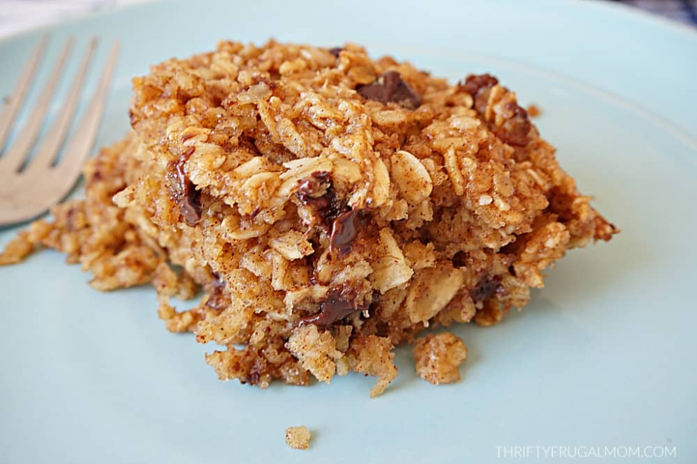 a slice of Chocolate Chip Baked Oatmeal on a pale blue plate