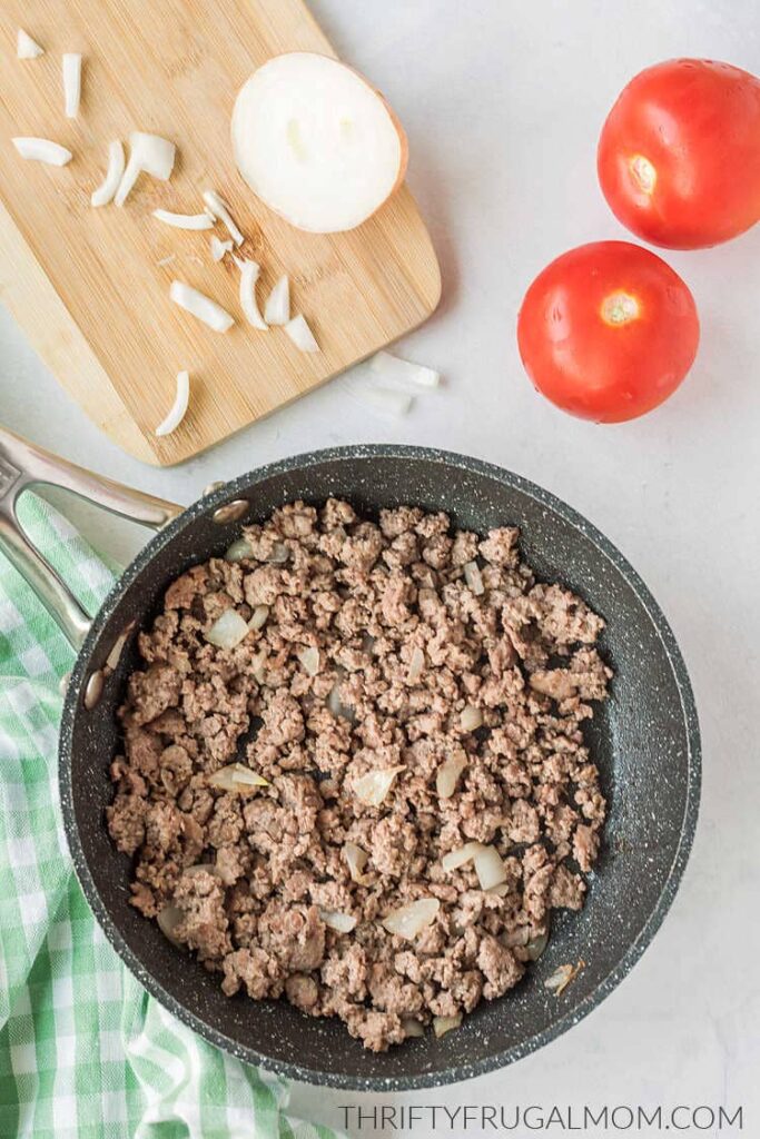 Fried ground beef with onion in a skillet