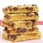 a stack of blonde brownie cookie bars