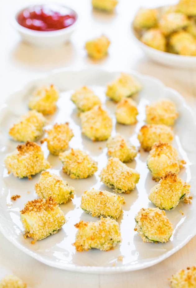 zucchini tots arranged on white plate