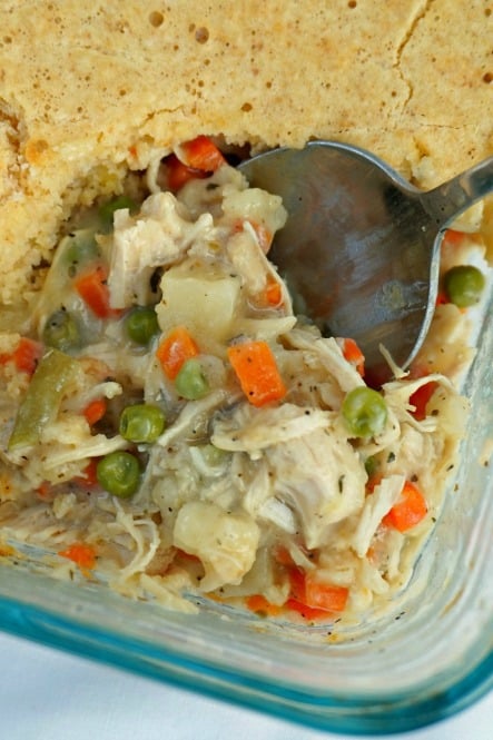 easy chicken pot pie in a casserole dish with a spoon