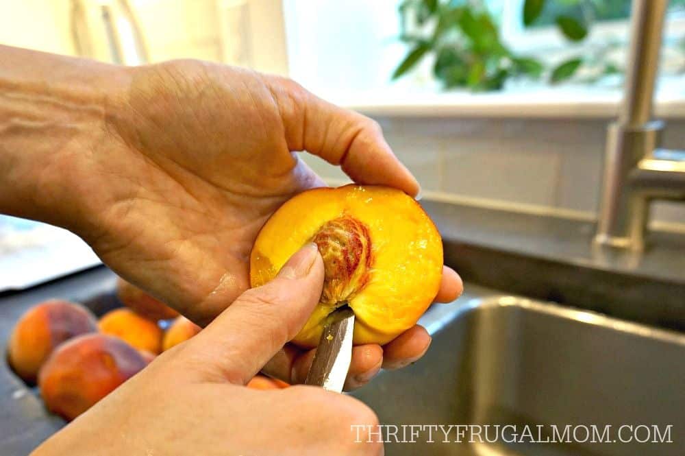 canning peaches- how to easily remove a peach pit