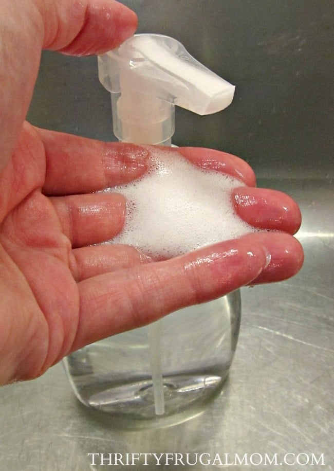 homemade foaming hand soap being pumped into a hand