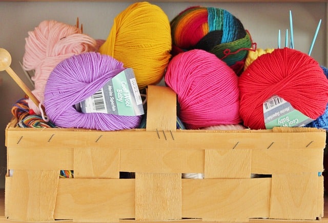 a basketful of bright colored yarn