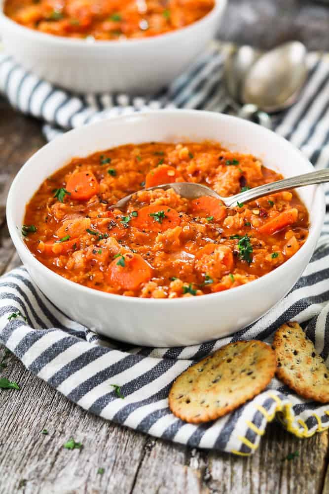 vegetarian Hungarian red lentil soup in a white bowl