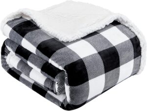 a black and white fuzzy plush blanket