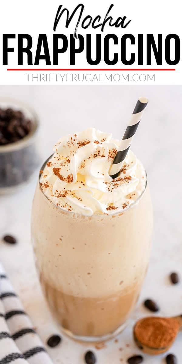 a glass of homemade mocha frappe with a straw in it