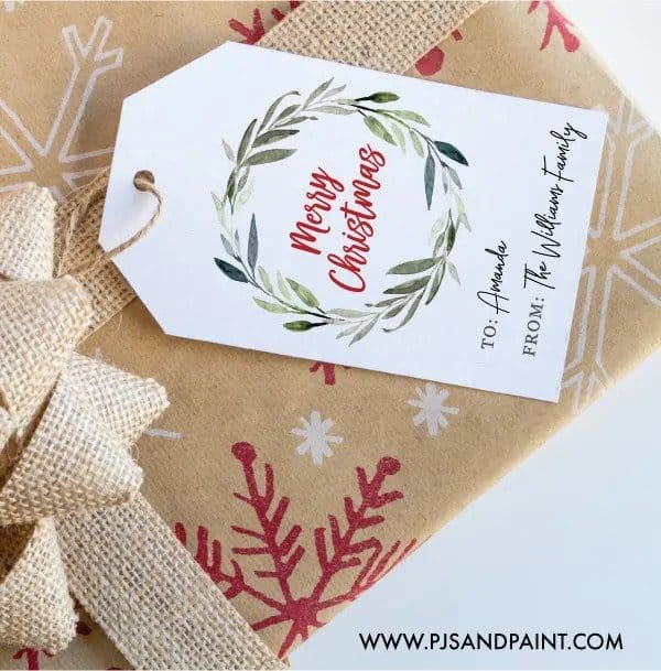 a Christmas gift with a Merry Christmas printable gift tag