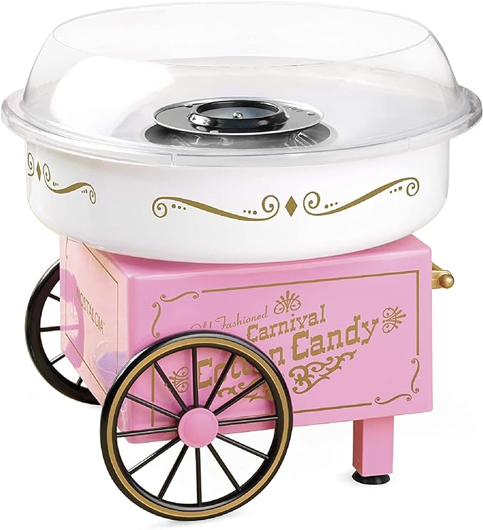 a small cotton candy maker on a pink stand with wheels
