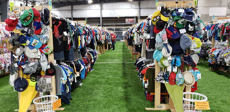 rows of clothing at a children's consigement sale
