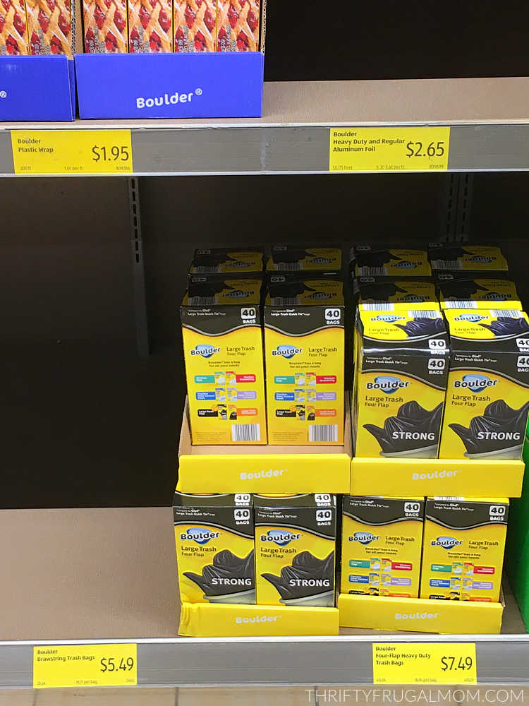 boxes of trash bags on a shelf at Aldi grocery store