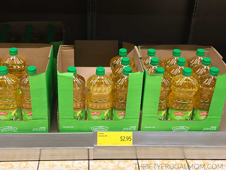 bottles of oil in boxes at Aldi