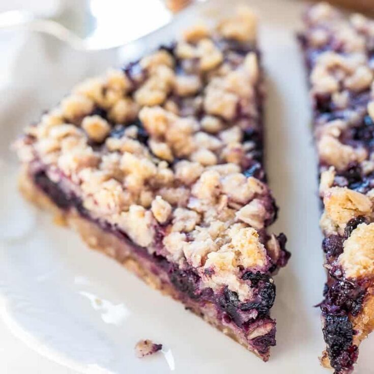 Eggless Blueberry Crumble Bars on a white plate
