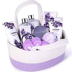 a purple and white cloth basket filled with various spa items- cheap gift for women
