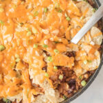 easy taco skillet with a spoon scooping a bite out.