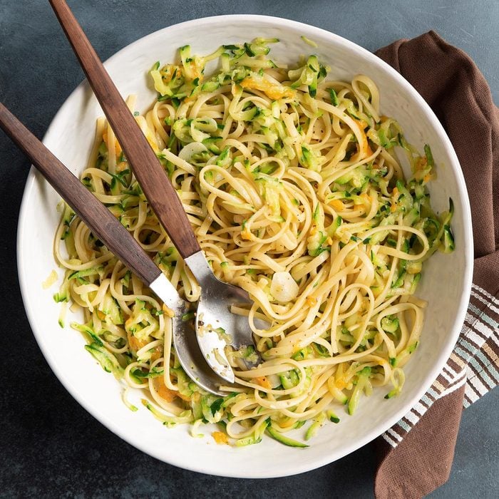 a bowl full of easy zucchini pasta recipe