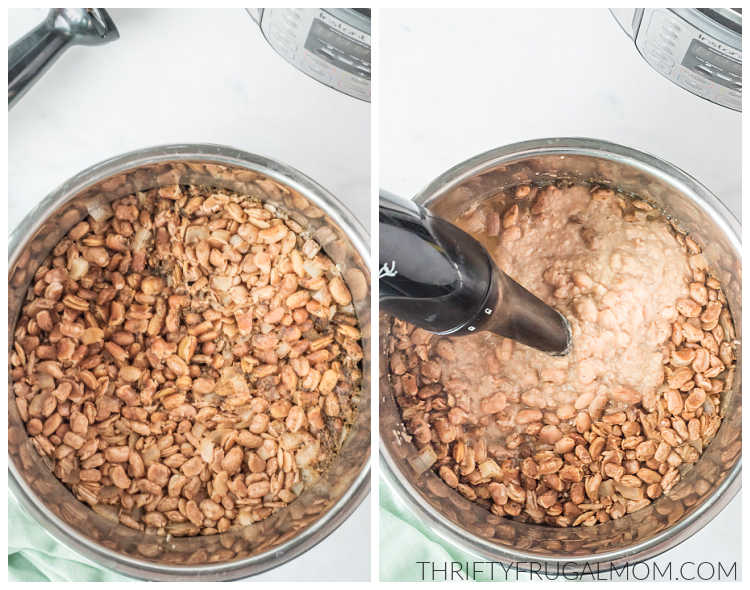 Pureeing the pinto beans using a hand blender.