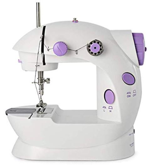 a white and purple kid's sewing machine